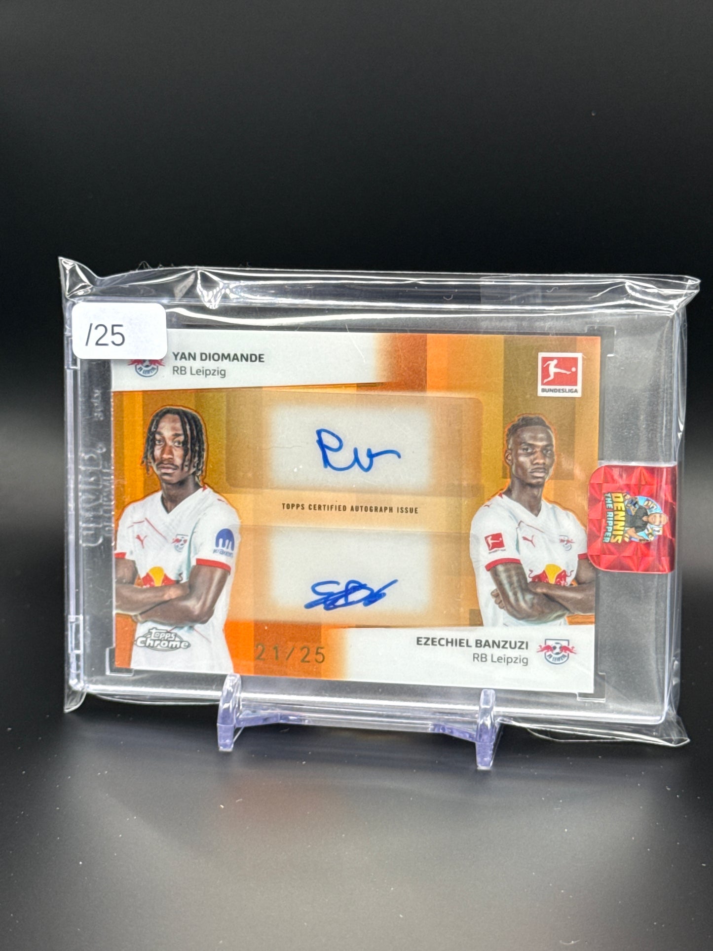 2025-26 Topps Chrome Bundesliga Yan Diomande / Ezechiel Banzuzi RB Leipzig Dual Orange Auto 21/25