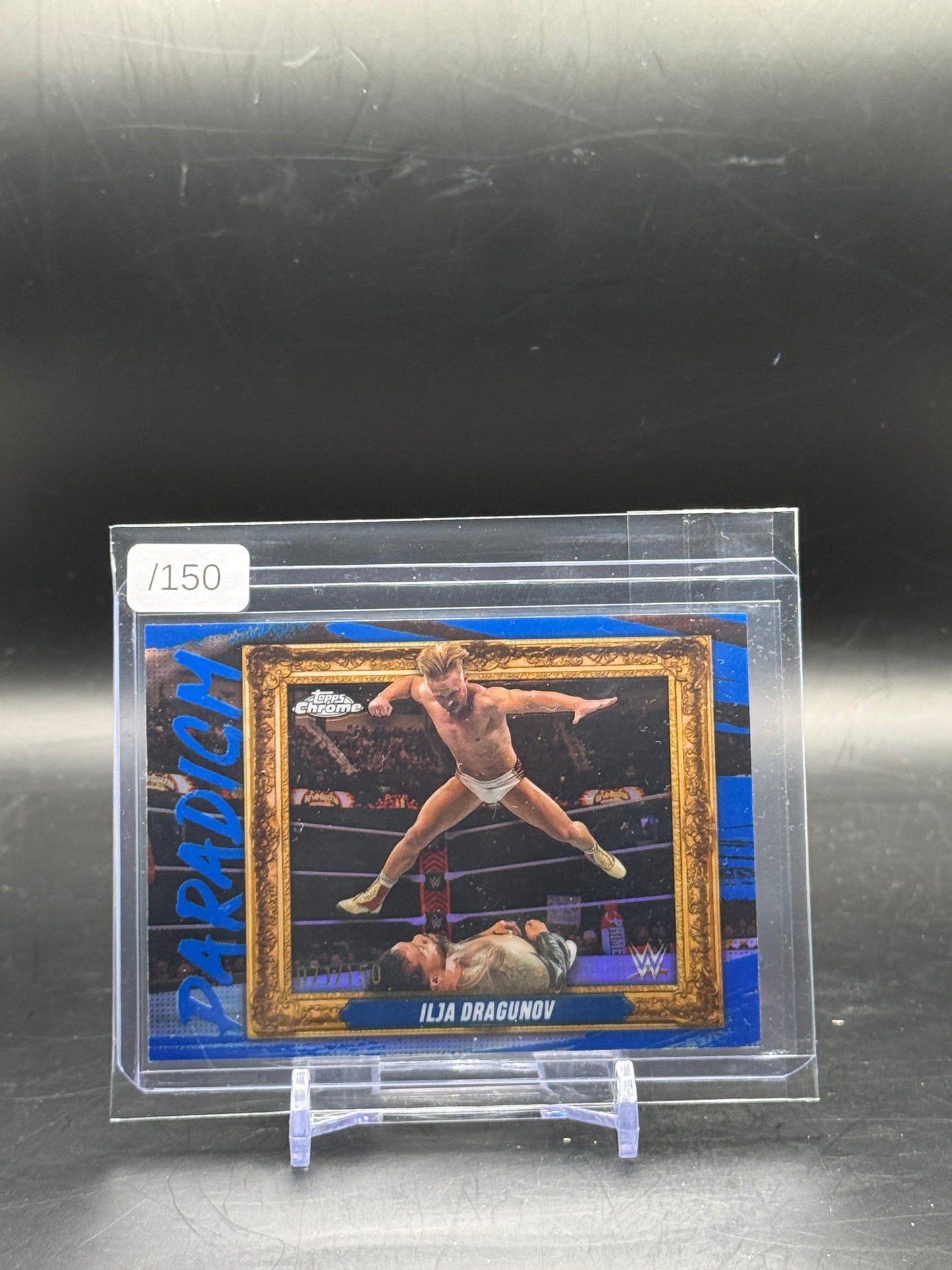2025 Topps Chrome WWE Ilja Dragunov Paradigm Blue Refractor 71/150