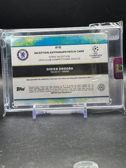 2024-25 Topps Inception UCC Didier Drogba Chelsea FC Orange Patch Auto 5/5